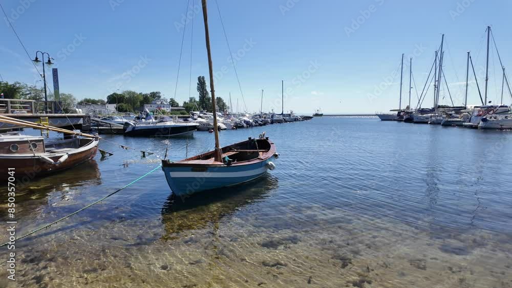 Port with yachts and ships of Polish village Jastarnia, slow motion video Port with yachts and ships of Polish village Jastarnia, slow motion video