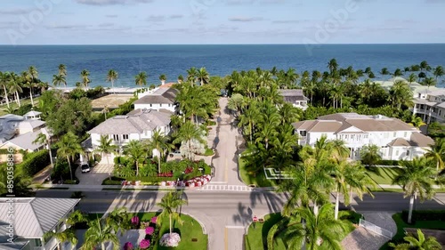 aerial homes and real estate along beachfront in naples florida photo