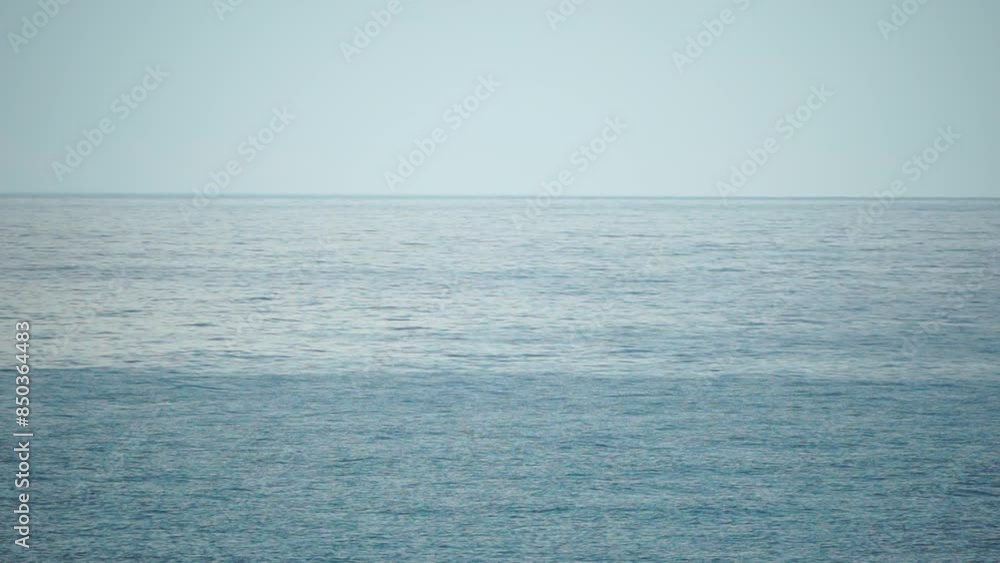 Sea water surface. Camera flies over the calm azure sea. Nobody. Holiday recreation concept. Abstract nautical summer ocean nature. Weather and climate change. Slow motion. Close up Sea water surface. Camera flies over the calm azure sea. Nobody. Holiday recreation concept. Abstract nautical summer ocean nature. Weather and climate change. Slow motion. Close up