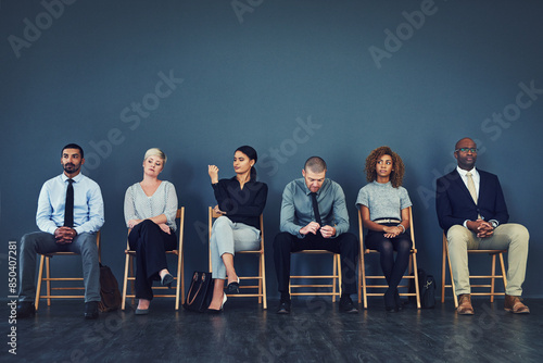 Obraz na plátně Business people, recruitment and waiting in line for interview with hiring process and employment opportunity