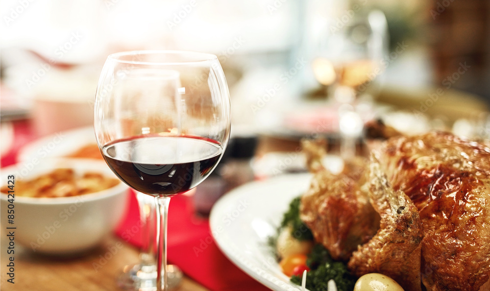 Christmas, food and alcohol on table in home for dinner party, celebration and family or social event. Closeup of feast, lunch and gourmet meal for holiday, festive eating and Thanksgiving with wine Christmas, food and alcohol on table in home for dinner party, celebration and family or social event. Closeup of feast, lunch and gourmet meal for holiday, festive eating and Thanksgiving with wine