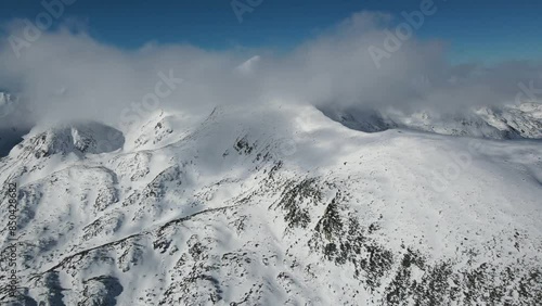 Amazing Aerial Winter view of Pirin Mountain near Polezhan and Bezbog Peaks, Bulgaria photo