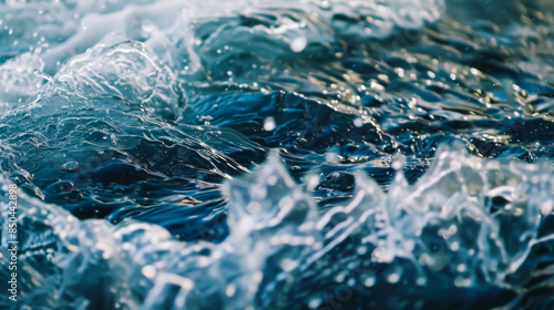 Close-up of a wave of clean transparent water. Dark blue water. Concept of nature, clean water.