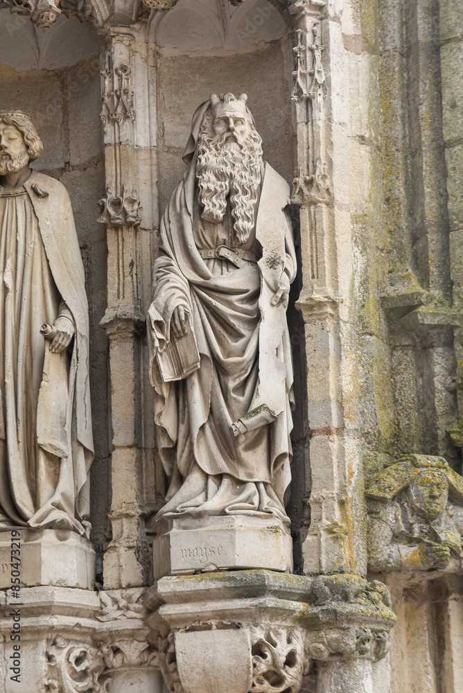 statue of moses at the entrance of the church of Auxonne in france
