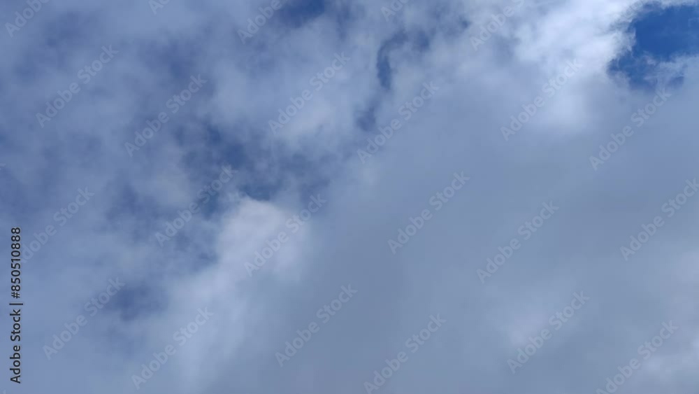 Curious altocumulus clouds move at dawn Curious altocumulus clouds move at dawn