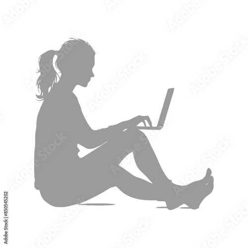 silhouette elderly woman playing on laptop while sitting cross legged