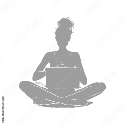 silhouette elderly woman playing on laptop while sitting cross legged