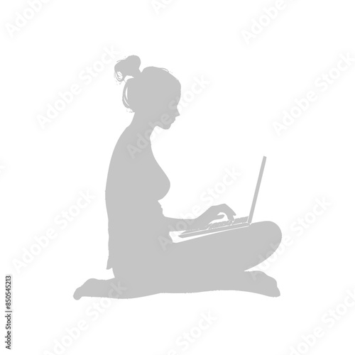 silhouette elderly woman playing on laptop while sitting cross legged