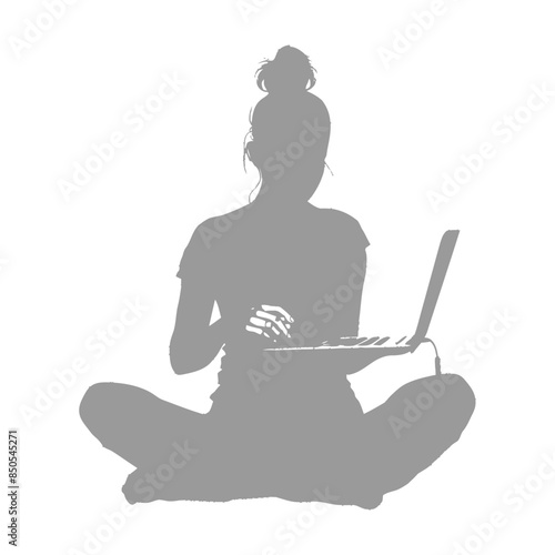 silhouette elderly woman playing on laptop while sitting cross legged