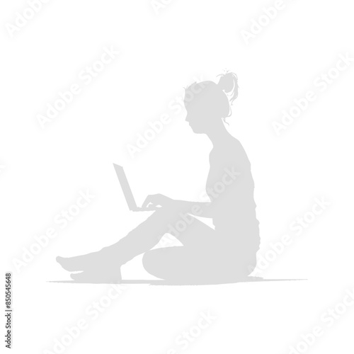 silhouette elderly woman playing on laptop while sitting cross legged