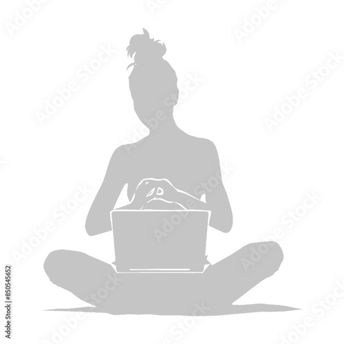 silhouette elderly woman playing on laptop while sitting cross legged
