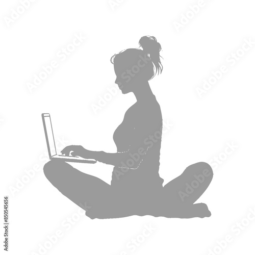 silhouette elderly woman playing on laptop while sitting cross legged