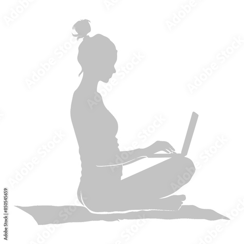 silhouette elderly woman playing on laptop while sitting cross legged