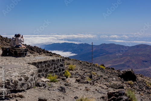 a couple takes a selfie from a viewpoint in the Teide National Park