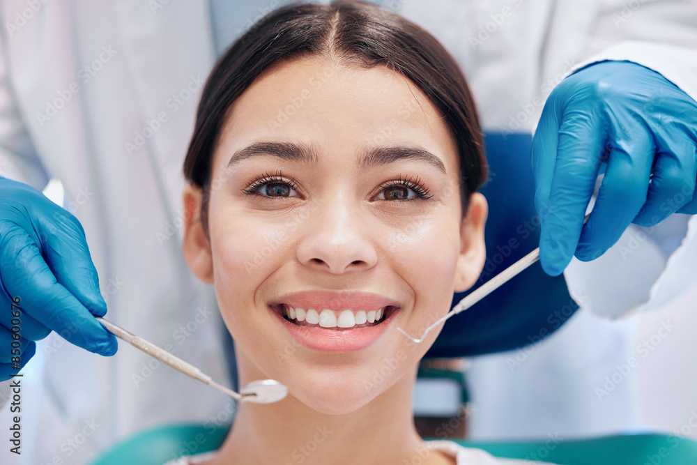 Girl, smile and dentist with equipment in clinic with oral health, healthcare and dental care. Patient, happy and portrait in hospital for cleaning, veneers or teeth whitening with excavator by mouth Girl, smile and dentist with equipment in clinic with oral health, healthcare and dental care. Patient, happy and portrait in hospital for cleaning, veneers or teeth whitening with excavator by mouth