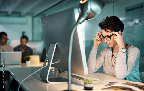 Office, headache and overworked woman with stress, anxiety and thinking by computer work. Burnout, mature employee and worker pain and fatigue from deadline, online research and digital report