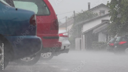 Raining, raindrops hit table, slow motion from 200fps footage