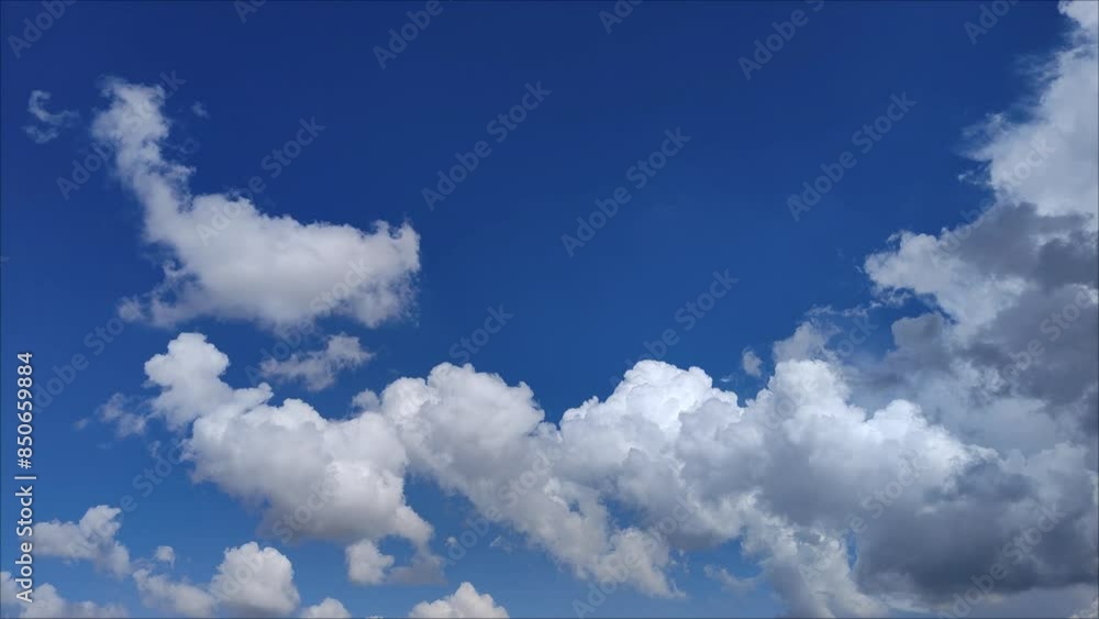 Sky landscape with white cumulus clouds with other clouds obscured Sky landscape with white cumulus clouds with other clouds obscured