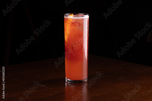 Billede på lærred long drink glass with refreshing red fruit cocktail