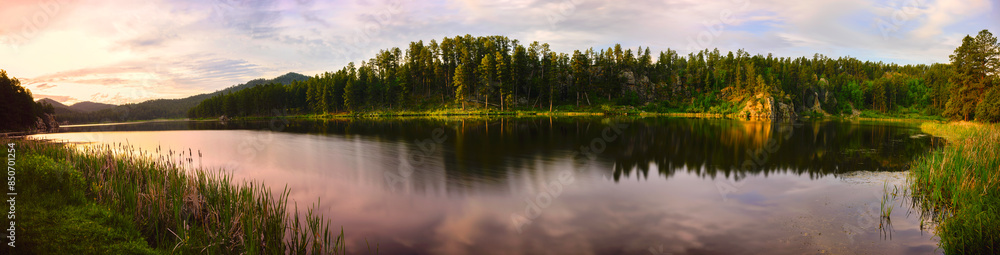 Tranquil Sunrise Panoramic Landscape at Stockade Lake in Custer State Park, South Dakota: The Black Hills Country Summer Skyline and Water Reflections Tranquil Sunrise Panoramic Landscape at Stockade Lake in Custer State Park, South Dakota: The Black Hills Country Summer Skyline and Water Reflections
