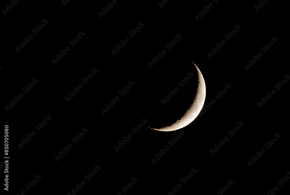 Real photograph of Crescent moon on black sky. Real photograph of Crescent moon on black sky.