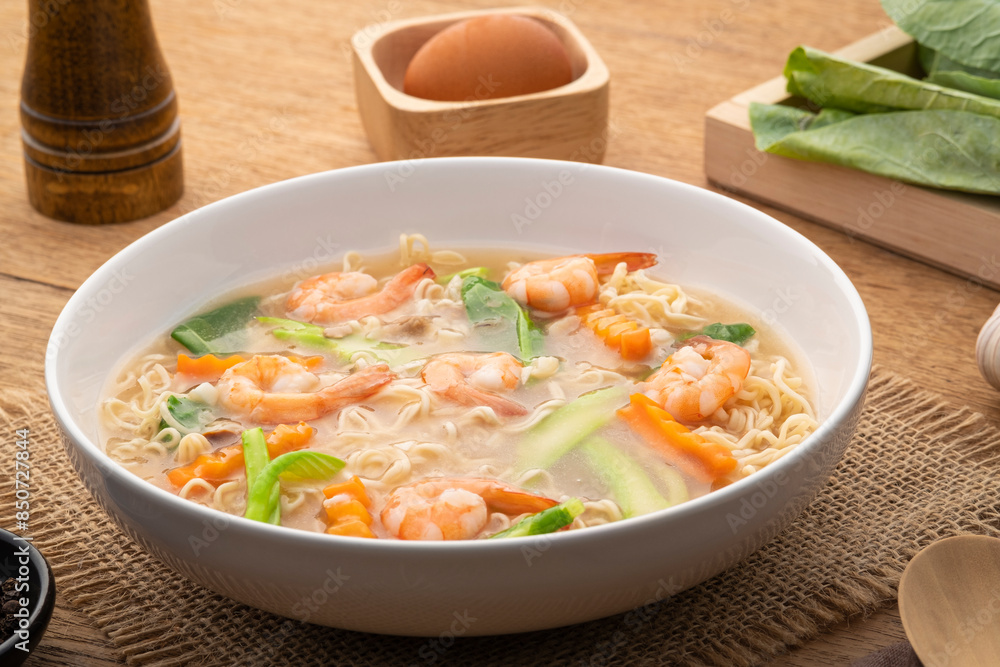 Fried Instant Noodles with Shrimp and kale carrot in Gravy Sauce (rad na goong).Thai food Fried Instant Noodles with Shrimp and kale carrot in Gravy Sauce (rad na goong).Thai food