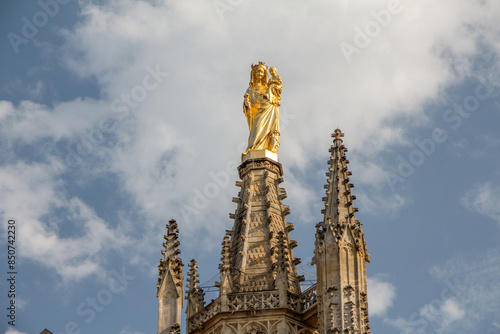 Golden statue of the Virgin at Pey Berland Tower, Bordeaux Cathedral, France