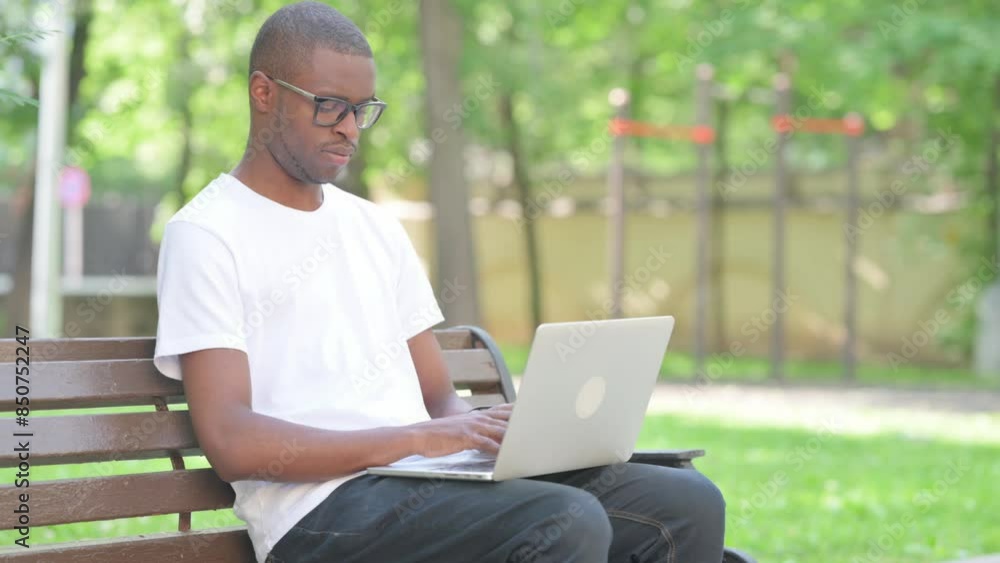 Young African Man Working on Laptop Outdoor Young African Man Working on Laptop Outdoor