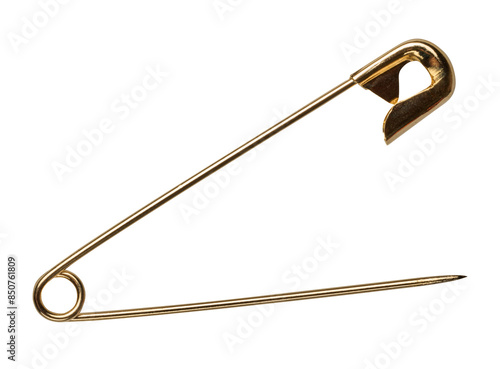 Golden metal safety pin on isolated background