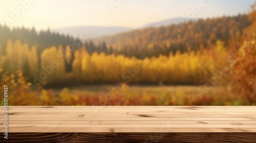 Wood table in autumn landscape with empty copy space for product display.
