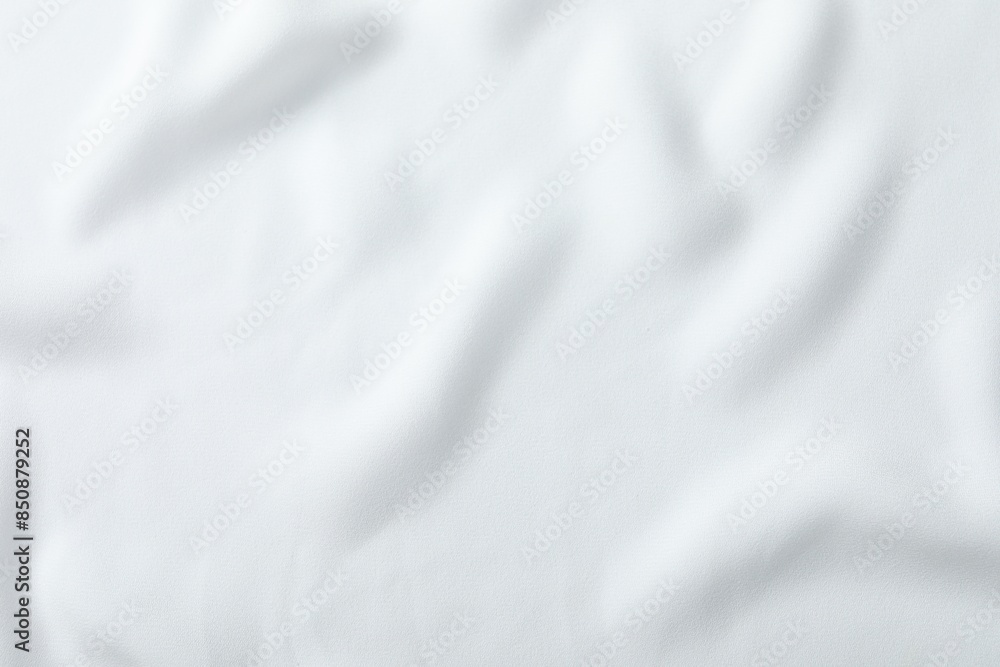 Fototapeta premium Texture of white fabric as background, top view