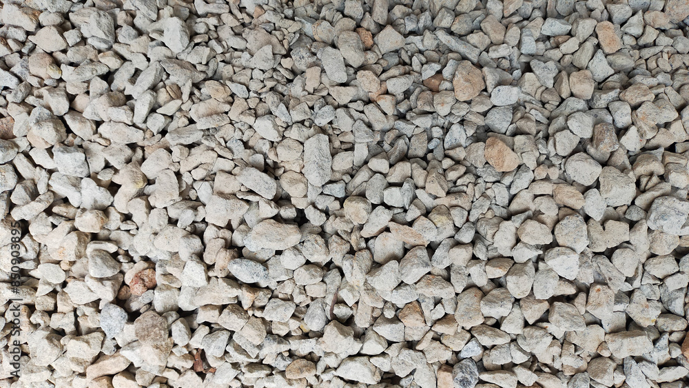 Close Up of Light Gray Gravel Texture with Various Rock Sizes for Construction and Landscaping Projects Close Up of Light Gray Gravel Texture with Various Rock Sizes for Construction and Landscaping Projects