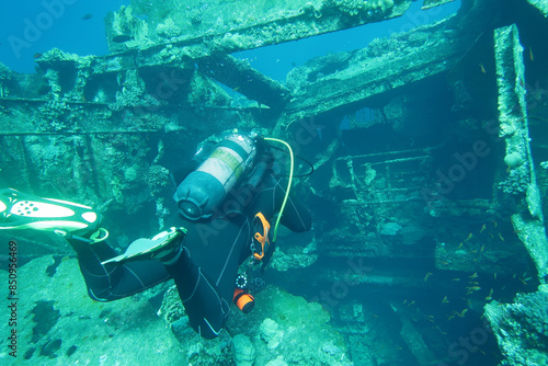 Diver entering a wreck in the Red Sea in Egypt photo