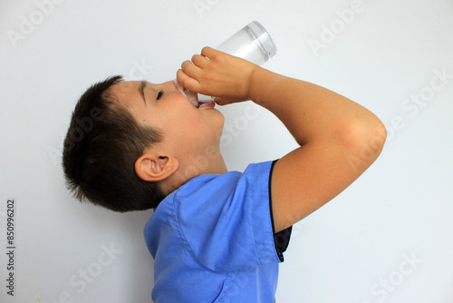boy is thirsty and drinks water