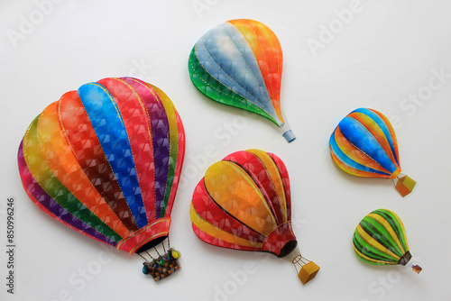 children's background: colorful parachutes on white