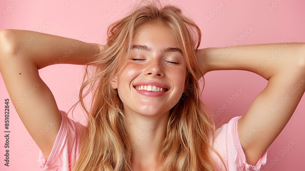 A woman's face, hands on head, closed eyes, hair blowing in the wind A woman's face, hands on head, closed eyes, hair blowing in the wind