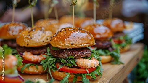 Meat-filled burgers were set out for event attendees on the table. photo