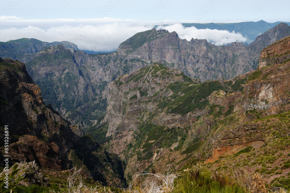 Fototapeta premium Mountain trail Pico do Arieiro, one of the highest mountains in Madeira, Portugal