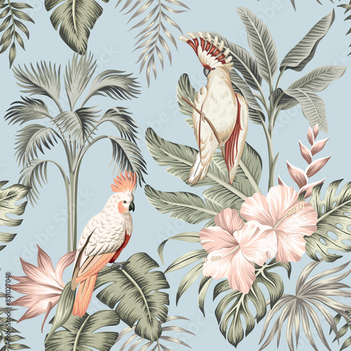 Tropical vintage palm leaves, pink hibiscus flower, pink cockatoo parrot floral seamless pattern blue background. Exotic jungle wallpaper