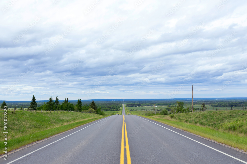 Scenic view from the highway with yellow solid lines in plains. Scenic view from the highway with yellow solid lines in plains.