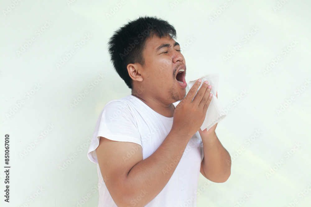 Sick Young asian man is flu and cough. Illness, influenza, pain concept. Healthcare and Corona Concepts. Sick Young asian man is flu and cough. Illness, influenza, pain concept. Healthcare and Corona Concepts.
