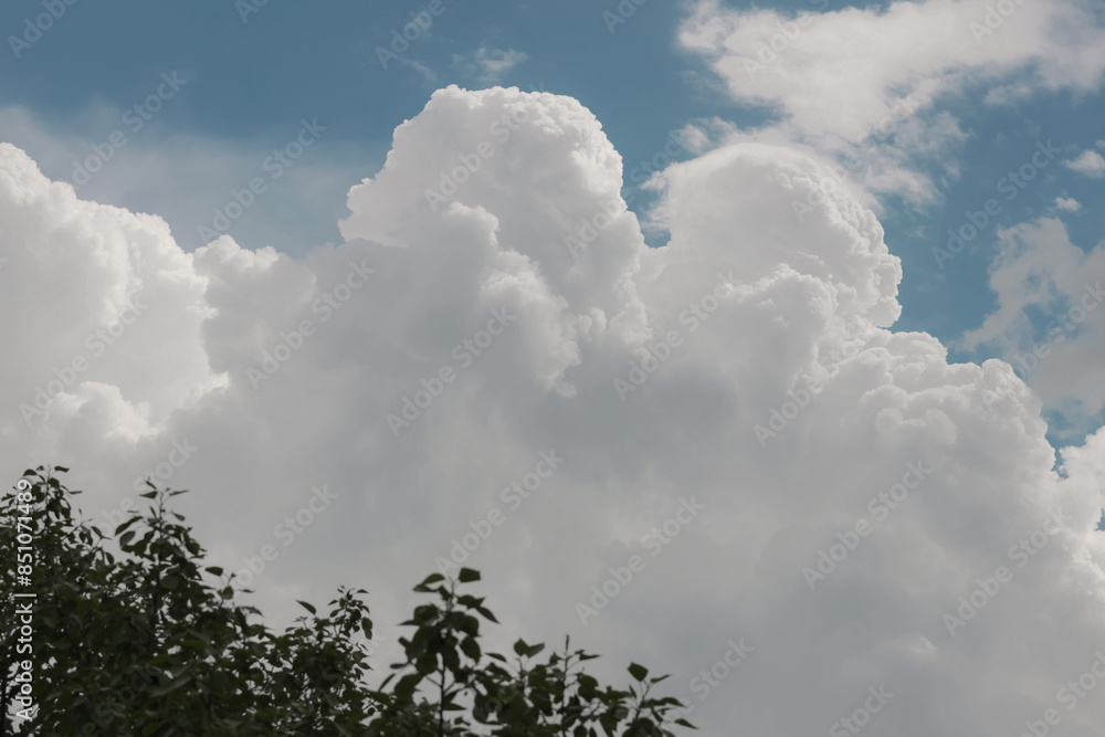 white thunderclouds in blue sky. summer cumulus clouds before rain. Beautiful view of nature and sky abstract background. photos of nature, elements, weather white thunderclouds in blue sky. summer cumulus clouds before rain. Beautiful view of nature and sky abstract background. photos of nature, elements, weather