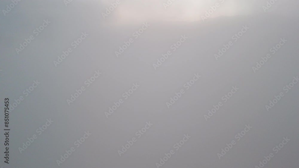 Aerial View of Clouds and Mountains at Sunset Aerial View of Clouds and Mountains at Sunset