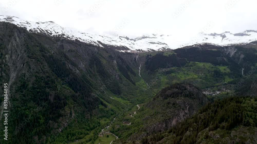 Aerial View of a Snowy Mountain Valley in Switzerland Aerial View of a Snowy Mountain Valley in Switzerland