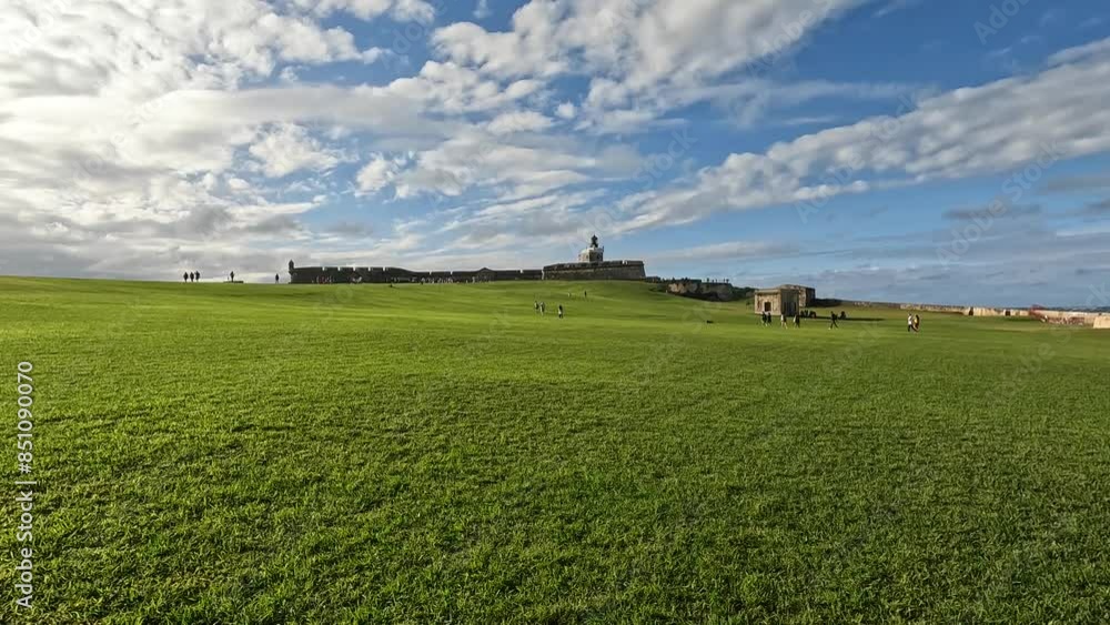 walking on the green lawn in front of castillo san felipe del morro (spanish colonial fort castle on hill old san juan puerto rico) beautiful national park travel tourism destination grass caribbean walking on the green lawn in front of castillo san felipe del morro (spanish colonial fort castle on hill old san juan puerto rico) beautiful national park travel tourism destination grass caribbean