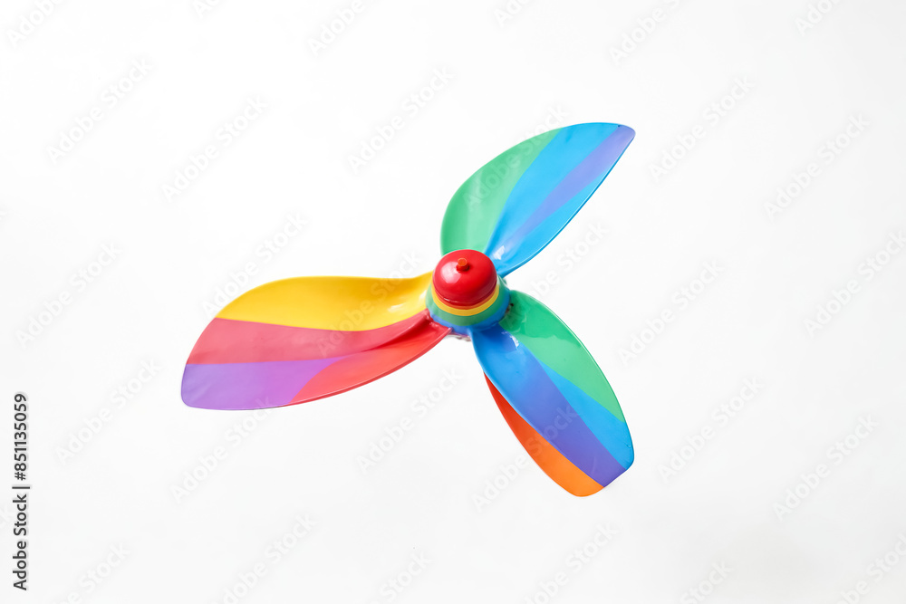 Obraz premium Colorful Pinwheel on White Background