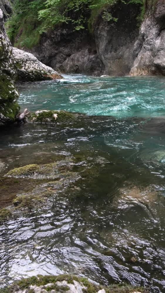 Vertical - The turquoise stream of Val Taleggio, a wonder of nature Vertical - The turquoise stream of Val Taleggio, a wonder of nature