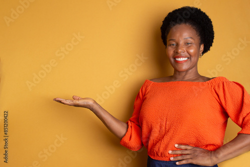 Wallpaper Mural black woman smiling and doing a gesture Torontodigital.ca