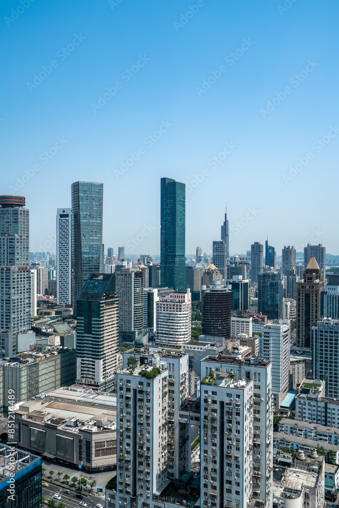 Naklejka premium Modern Urban City Skyline Under Blue Sky