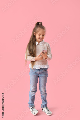 Cute little girl in sweater...